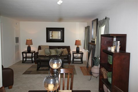 a living room with a couch and a table