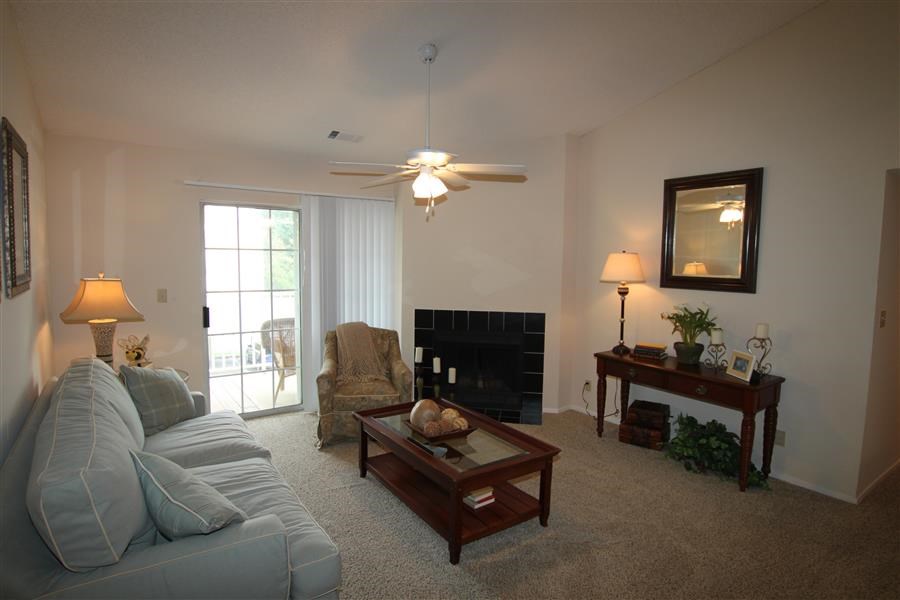 a living room with a couch and a table