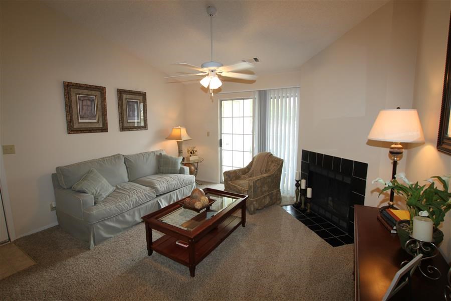 a living room with a couch and a coffee table