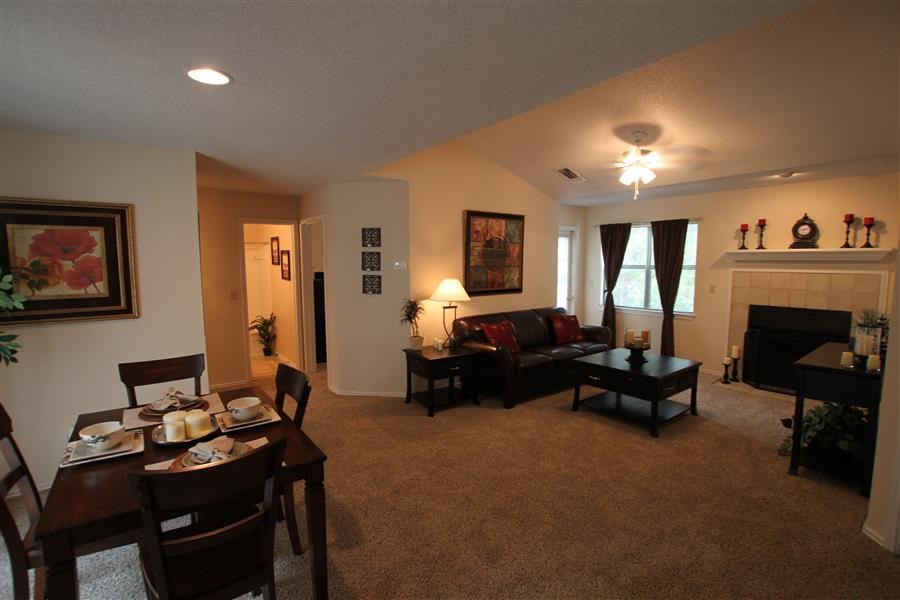 a living room with a couch and a table