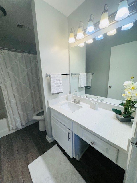 a bathroom with a white sink and a mirror