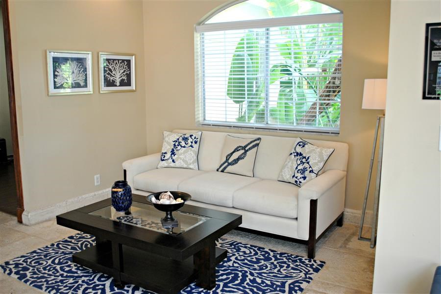 a living room with a couch and a coffee table