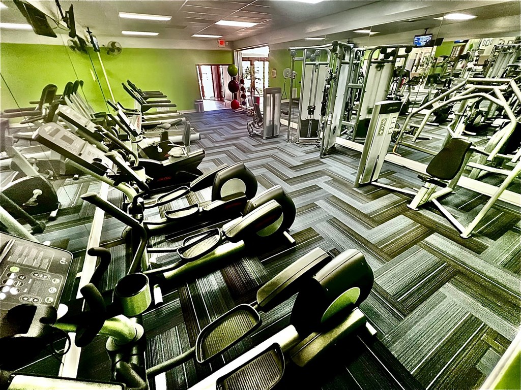 a view of the gym at the fitness center