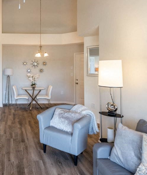 a living room with a couch and a table