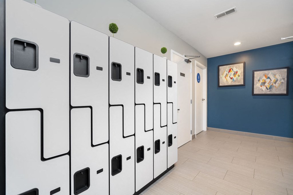 a row of white lockers in a hallway