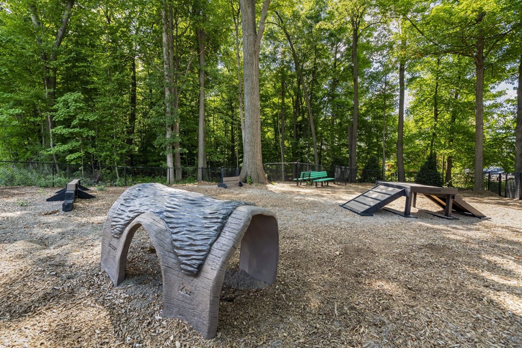 a bench and picnic table in a park