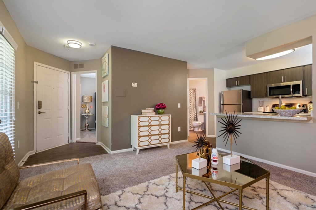 a living room with a couch and a table