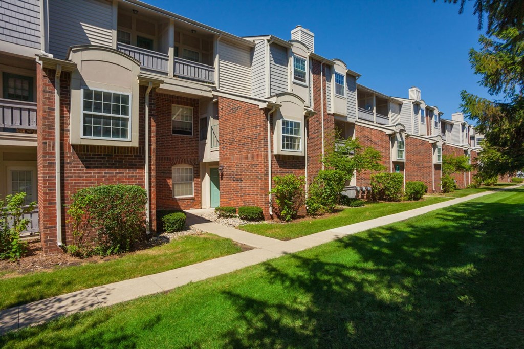 our apartments are located in a quiet neighborhood with green grass