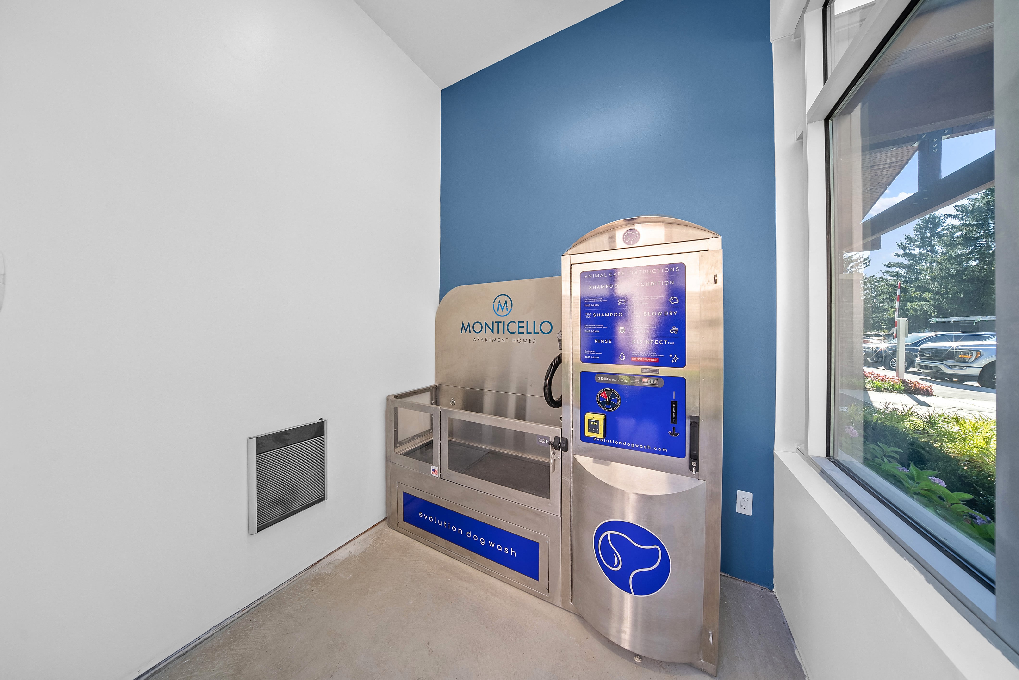 a vending machine in a room next to a window