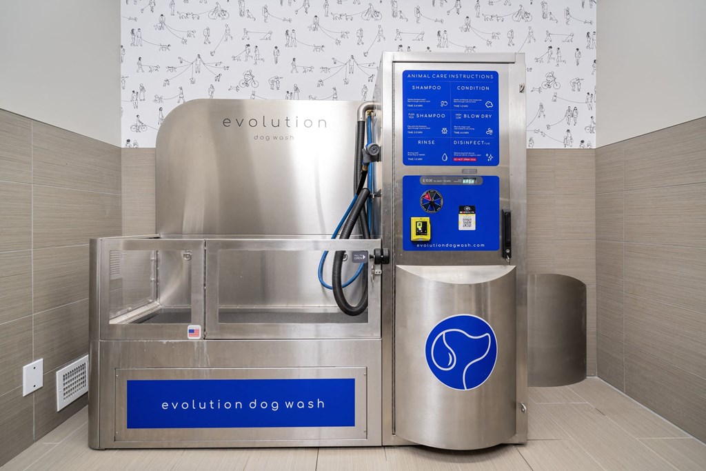 a water dispenser in a room with a water heater and a refrigerator