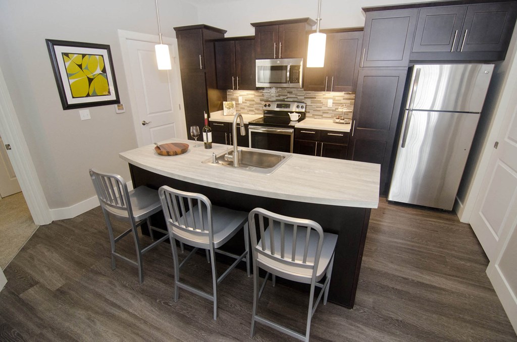 Kitchen and dining at Aspen Lakes in Holt, MI