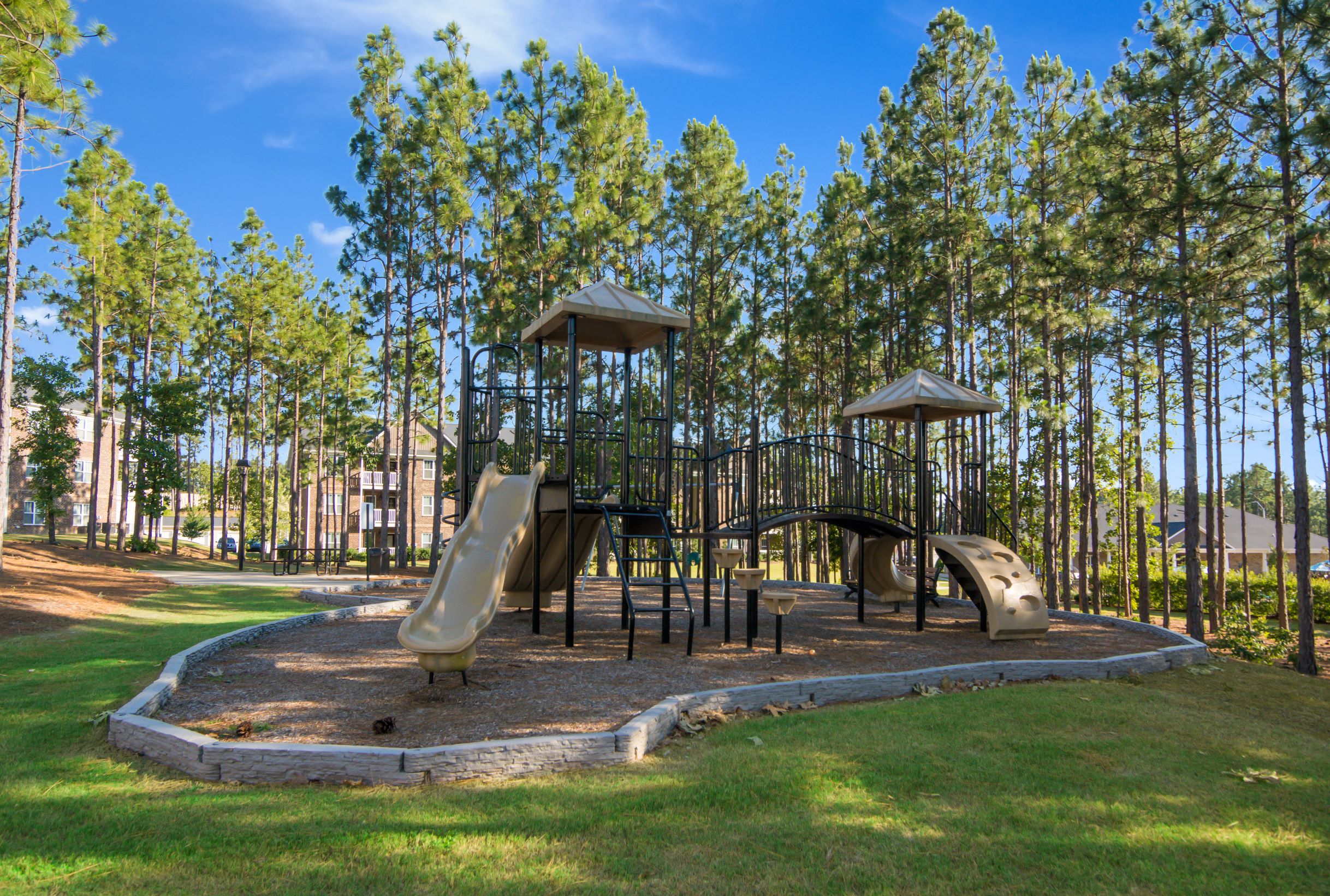 children s playground with slides and swings at a park