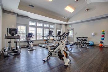 Fitness Center with Machines and Weights at River Crossing Apartments, St. Charles, Missouri