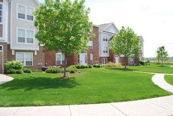 Beautiful Park-like Grounds at Brentwood Park Apartments in La Vista, NE