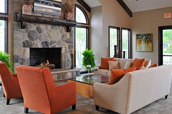 Cozy Clubhouse Fireplace Seating at Southport Apartments, Belleville