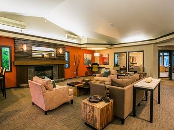 Luxurious Resident Clubhouse with Seating Lounge and Fireplace at Vancouver Apartments near PeaceHealth Southwest Medical Center