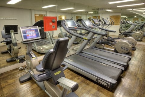 Fitness center with cardio machines at Sunset Barrington Gardens