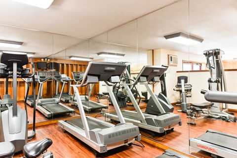 24-hour fitness center at Village Pointe Apartment Homes