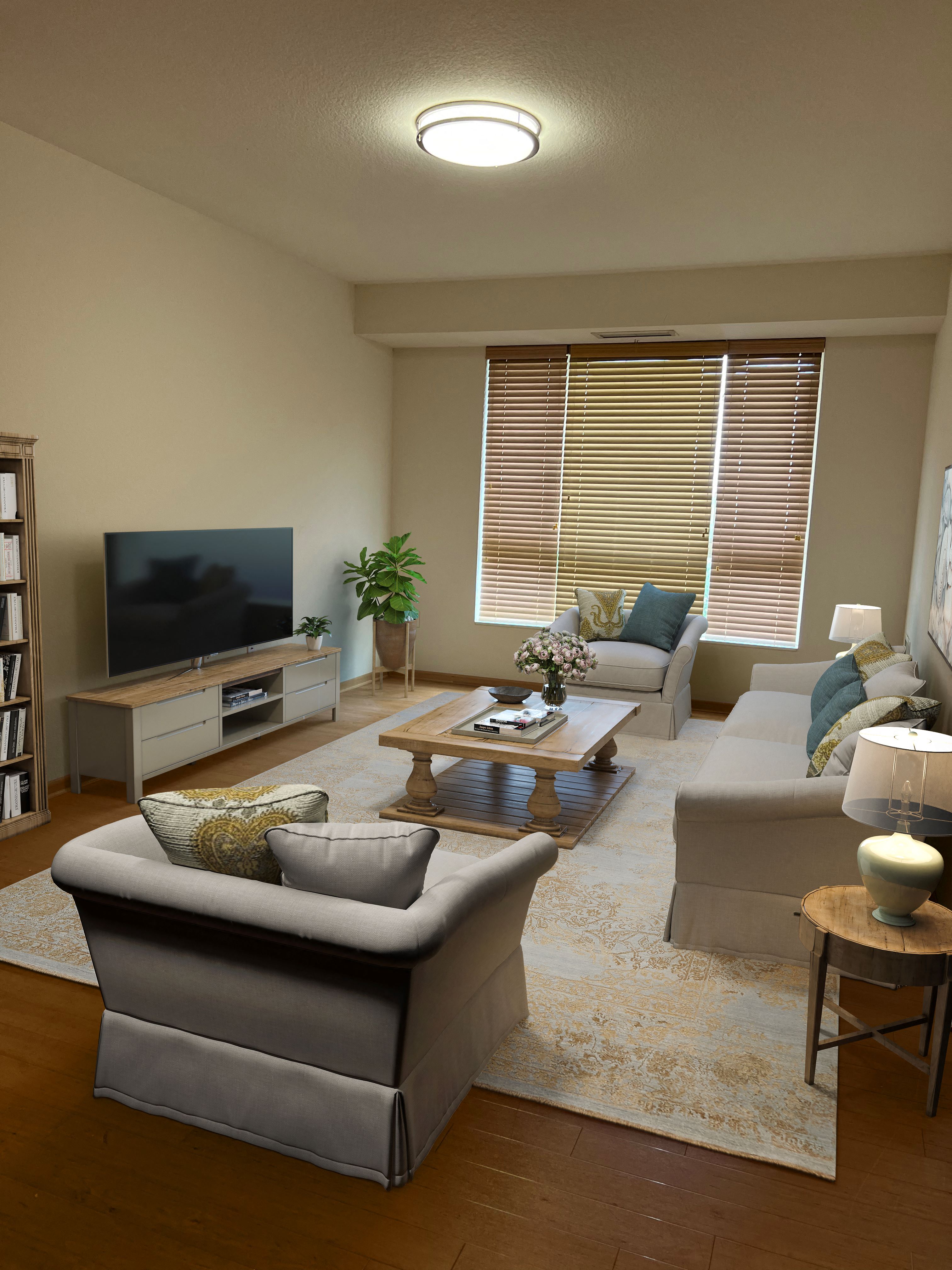 a living room with a couch and a tv