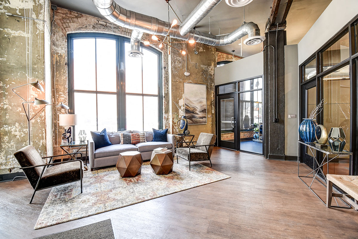 a living room with a couch and a table
