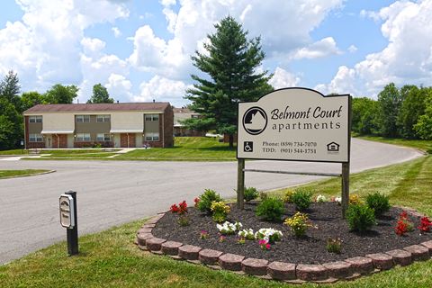 a picture of the belmont court apartments sign