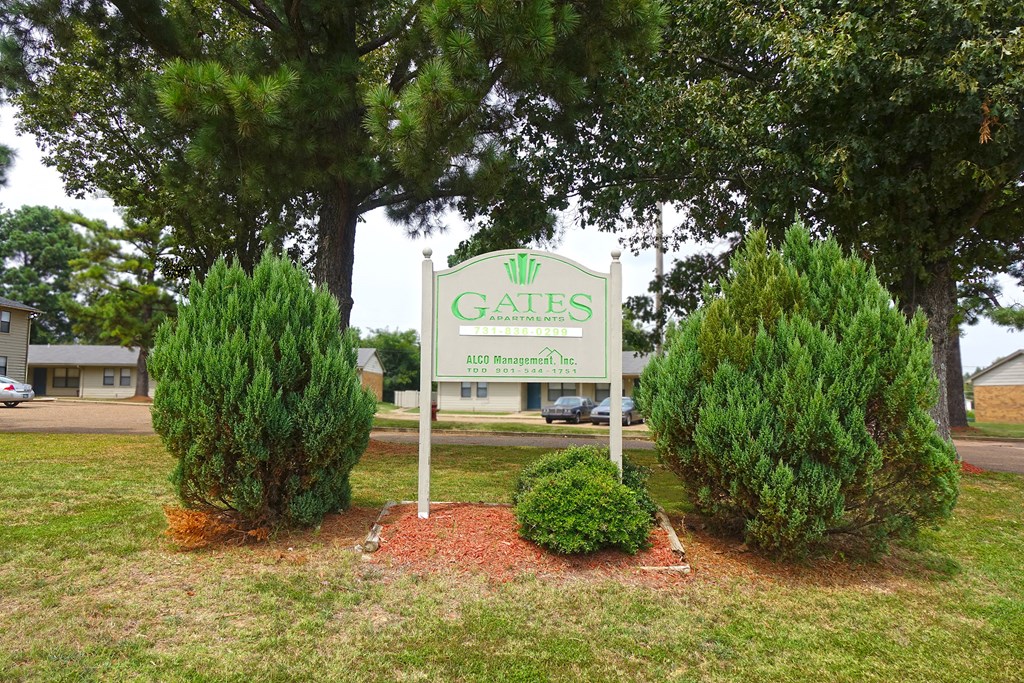 our sign in front of our apartments in the community