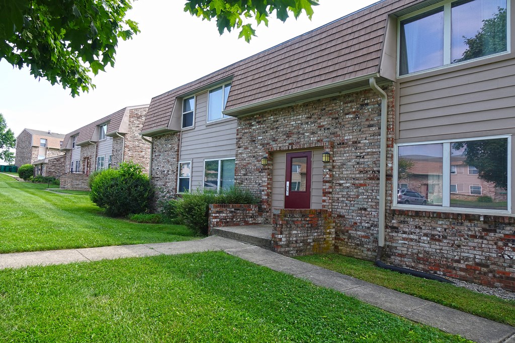 our apartments are located in a quiet neighborhood with a lawn