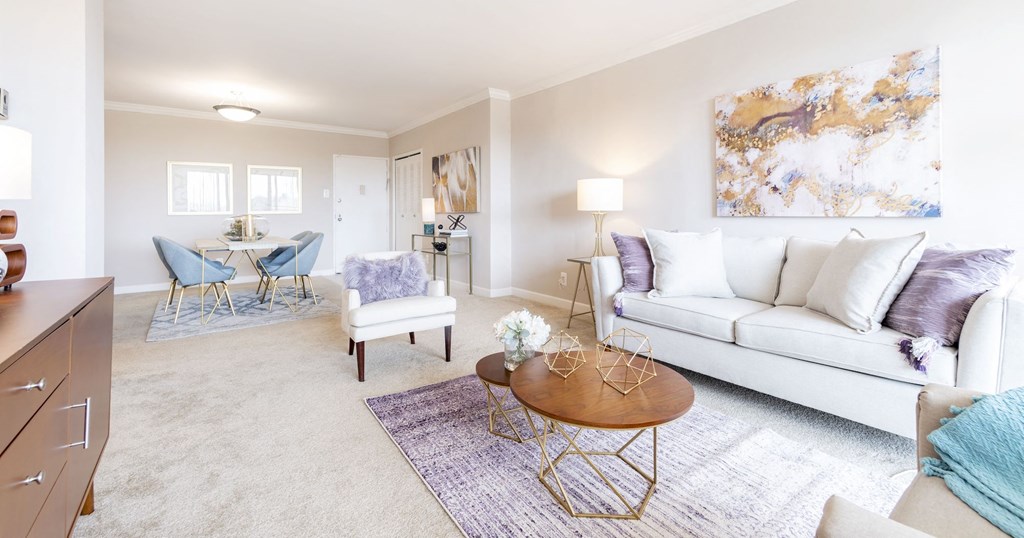 a living room with a couch and a table