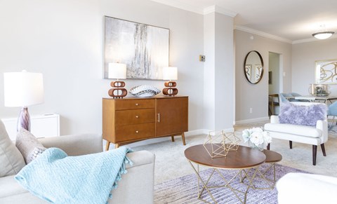 a living room with a couch and a table