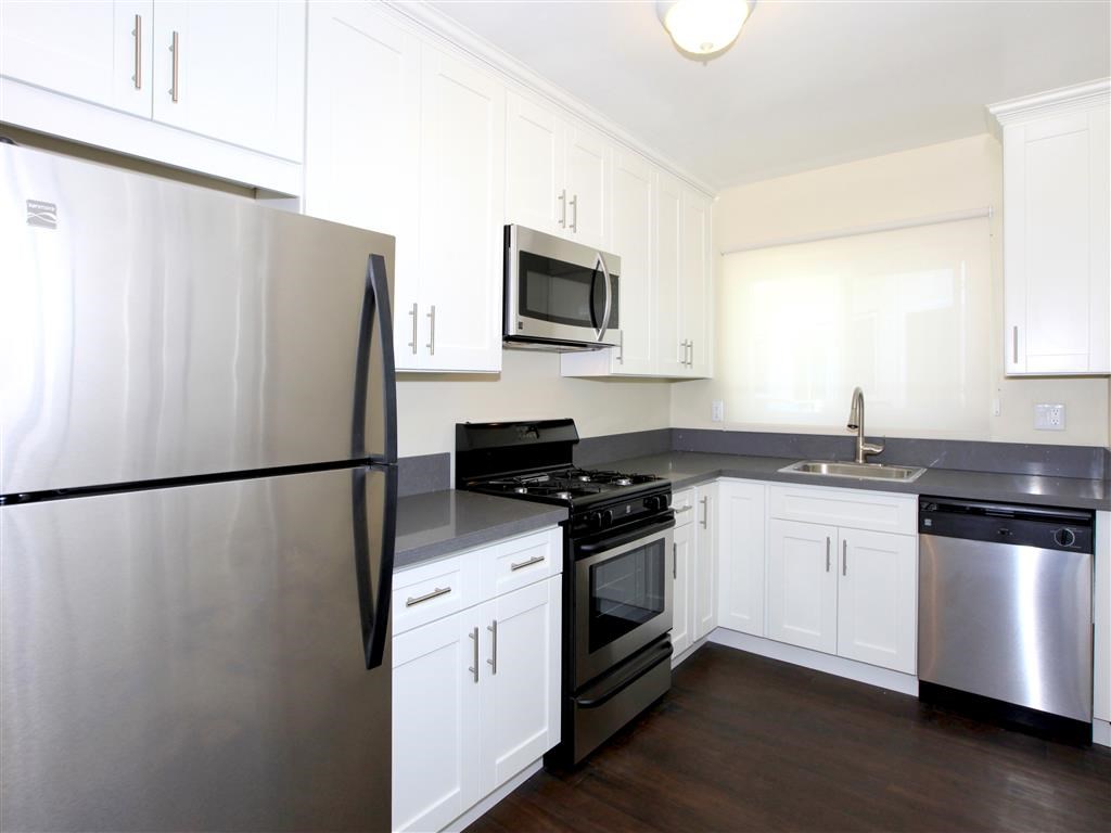 Kitchen with fridge and stove