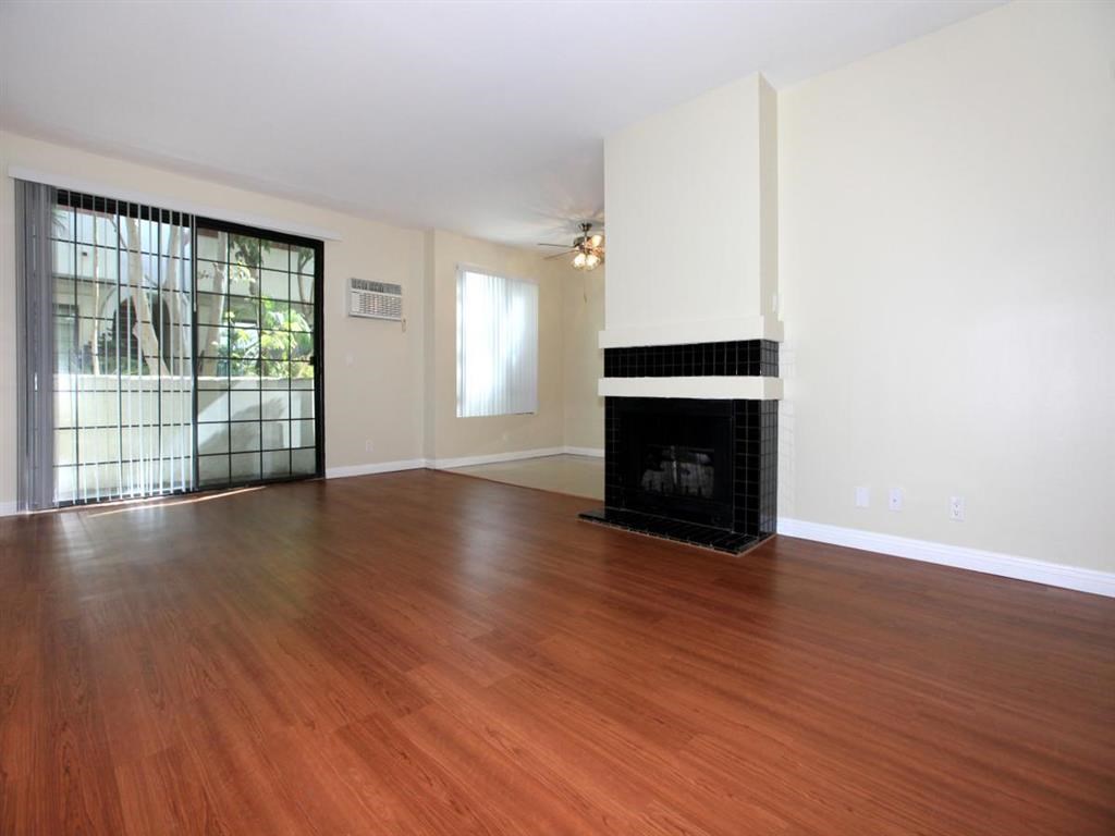 living room with fireplace and hardwood floors