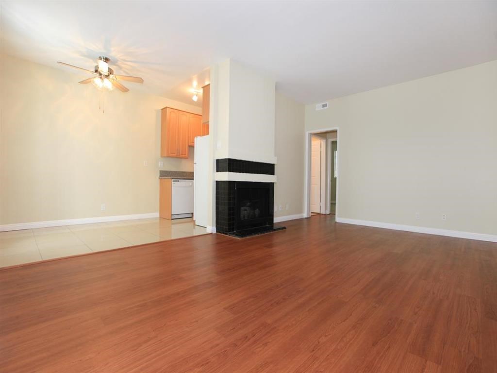 Living room and kitchen with fire place