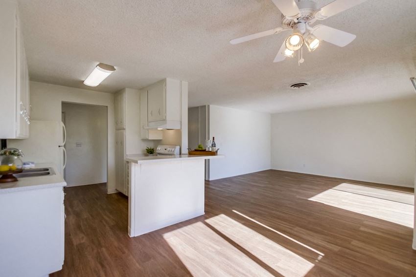 Villa Capri Apartments Empty Apartment Dining Room & Living Room - Photo Gallery