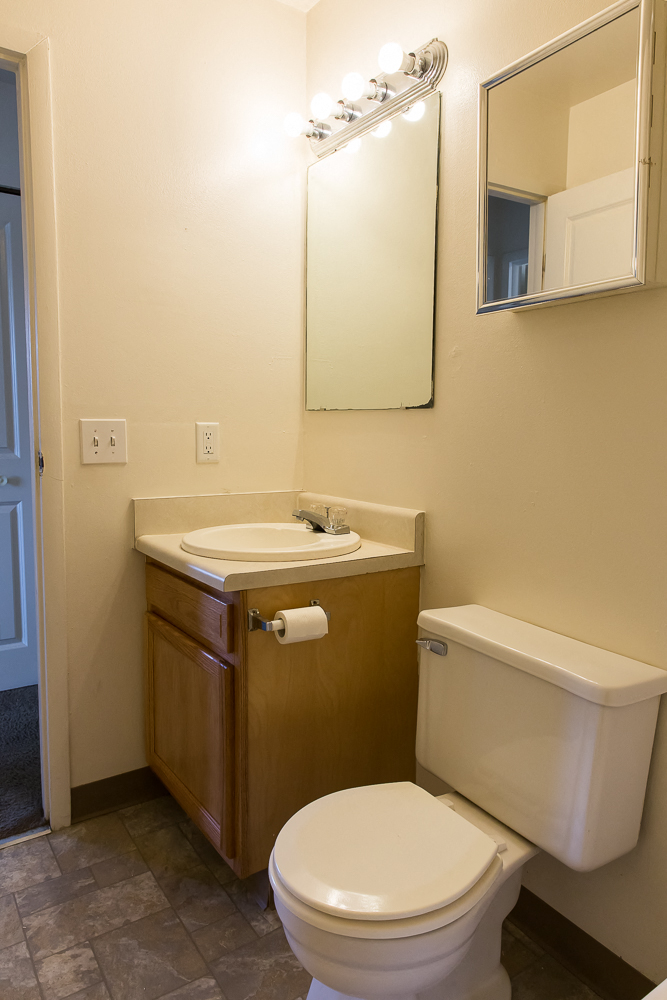 a small bathroom with a toilet and a sink