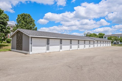 A long row of garage doors are closed.