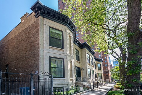 a row of brick buildings on a city street