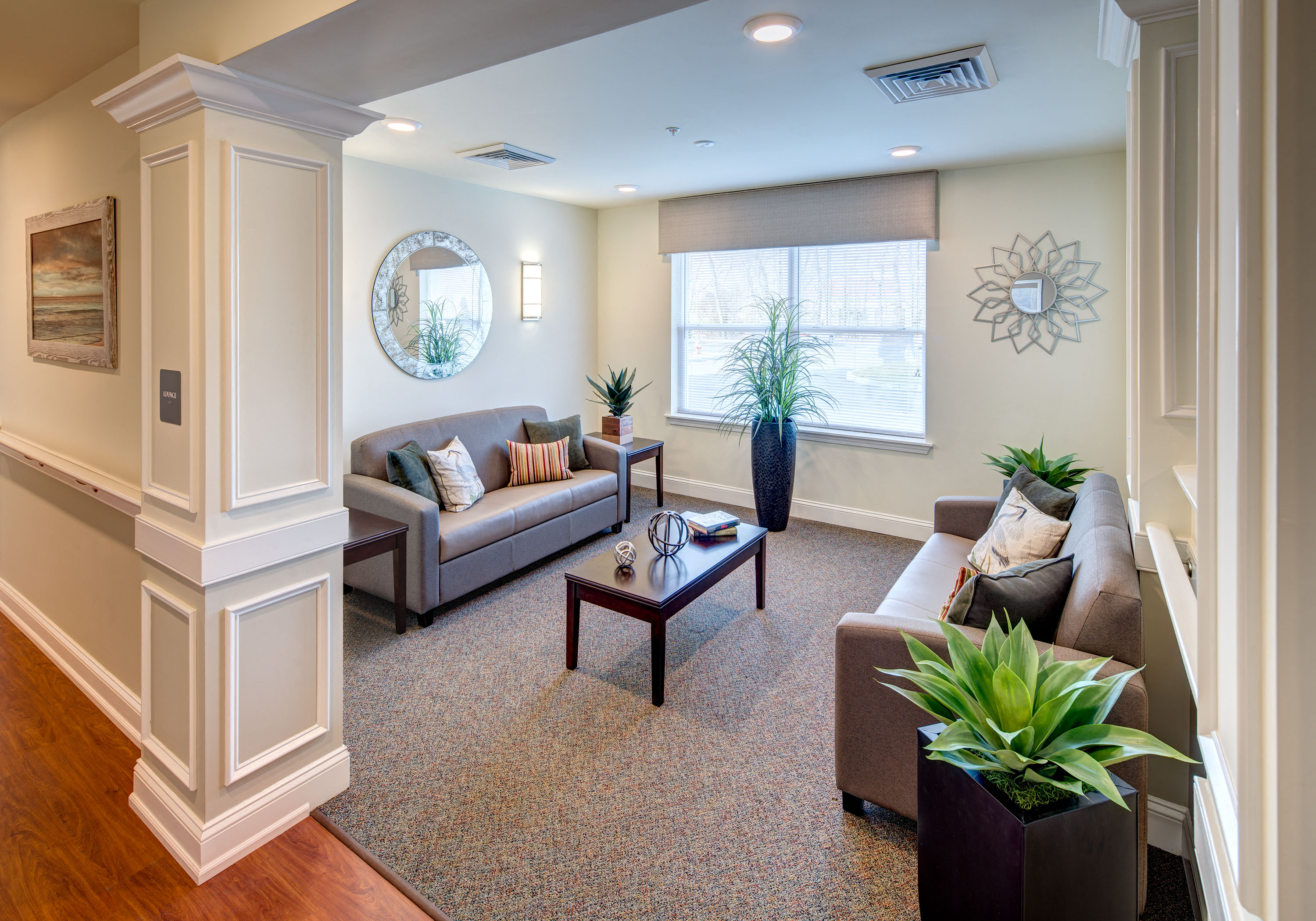 a living room with couches and a table