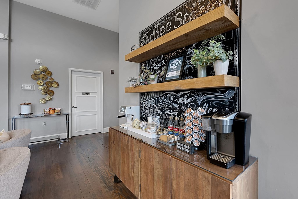 a coffee bar in a living room with a white door