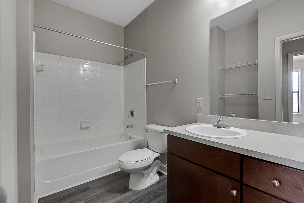a bathroom with a sink toilet and a shower