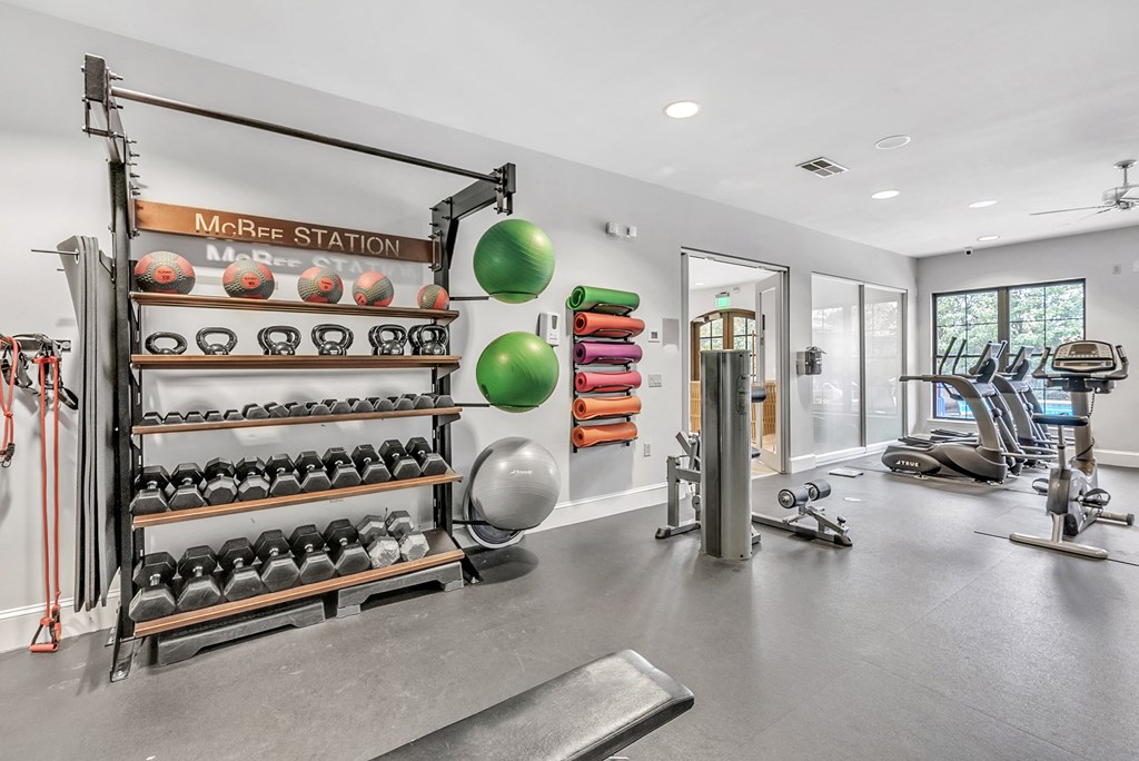 the gym with weights and exercise equipment at 1861 muleshoe road