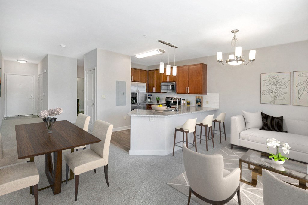 a living room and kitchen with a table and chairs