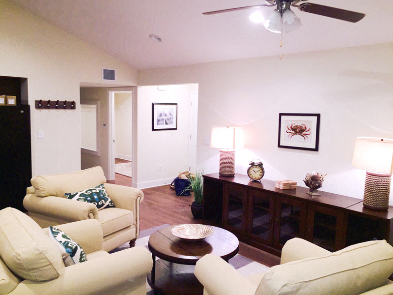 a living room with couches and a table