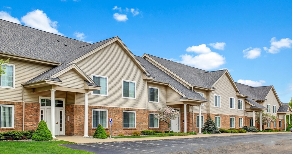 a row of town homes with brick and siding