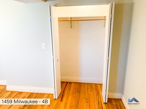 the door is open to the closet in the master bedroom