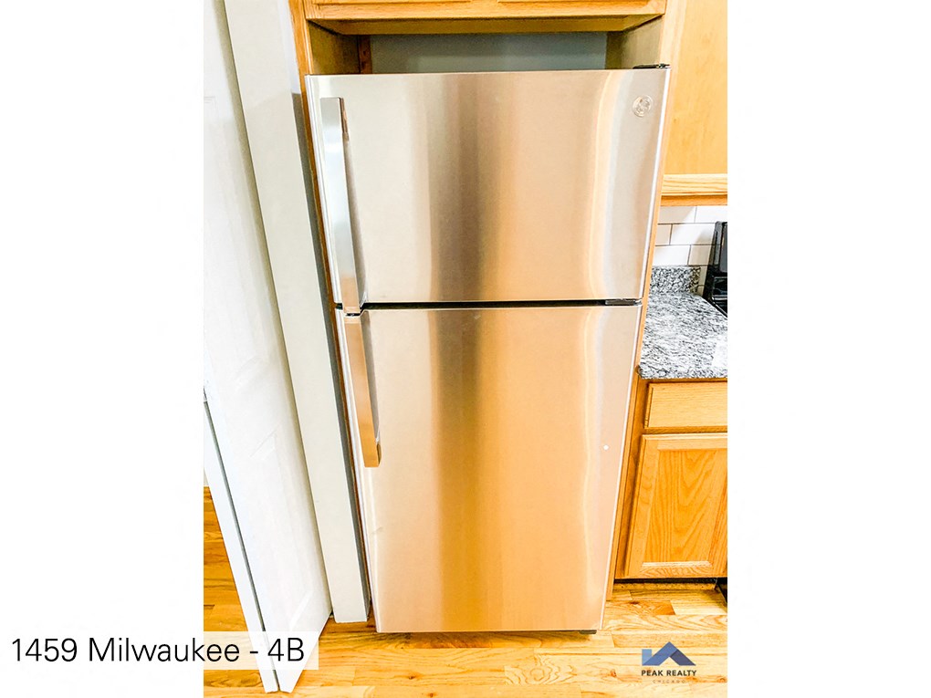 a stainless steel refrigerator in a kitchen
