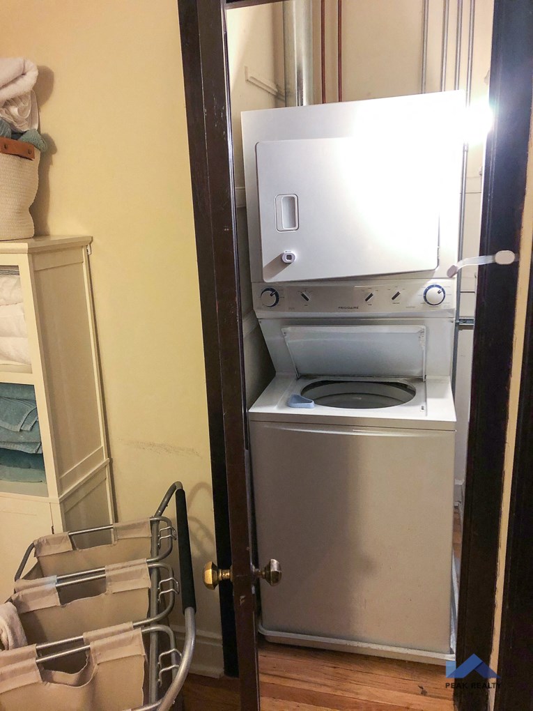 the laundry room has a washer and dryer in it