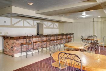 Room with chairs and table at Harbor Crest, Euclid, 44123