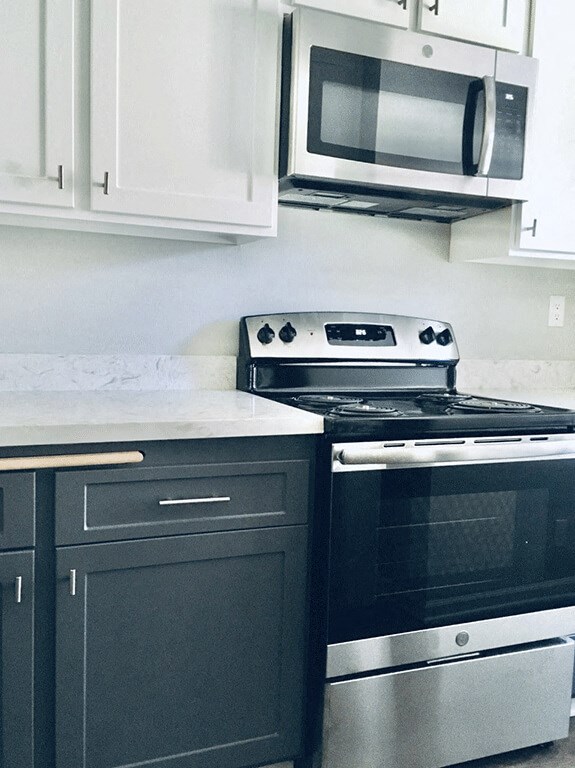 Kitchen With New Appliances at Wilbur Oaks Apartments, California, 91360