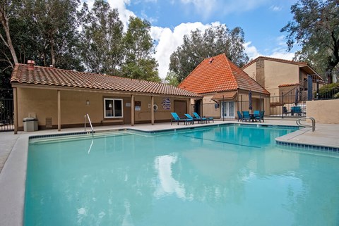 Swimming Pool And Relaxing Area at St. Charles Oaks Apartments, Thousand Oaks, CA