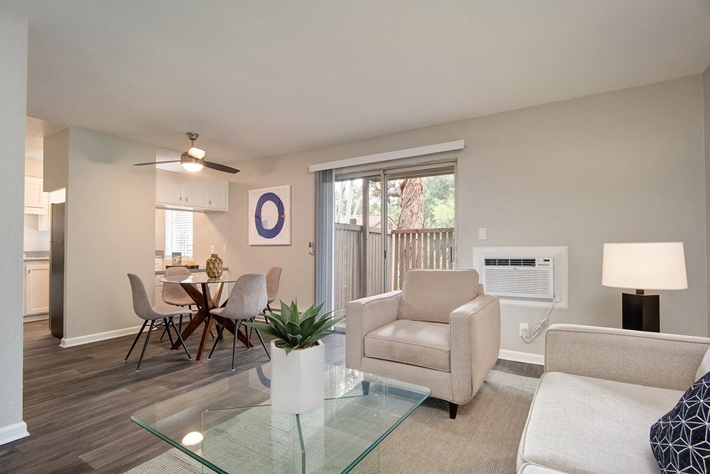 Sofa, Dinning Table in Living Room at St. Charles Oaks Apartments, California